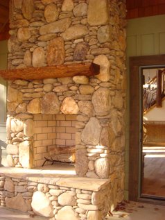 screen porch rock fireplace